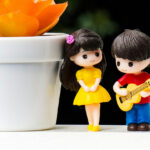 Figurine of boy and girl