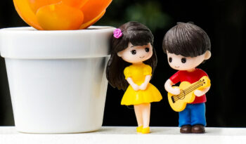 Figurine of boy and girl